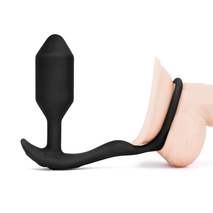 A penis ring and butt plug combo like the b-Vibe Vibrating Snug and Tug is one of the best sex toys to use during your ball sucking session