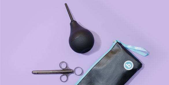 This b-Vibe Anal Training Kit includes a travel bag, lubricant launcher, and an anal enema